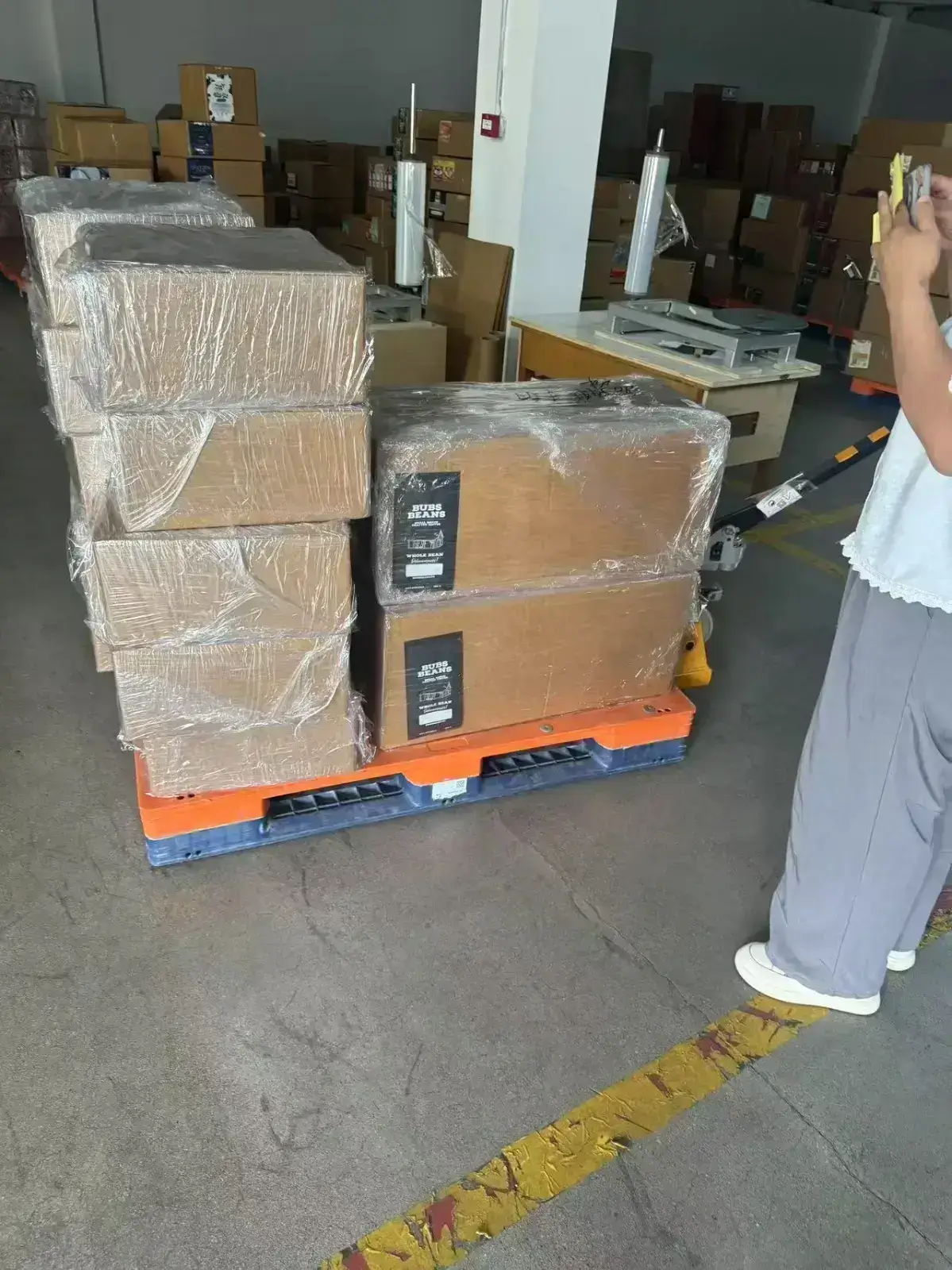 stacked boxes of mylar bags ready for shipping in warehouse