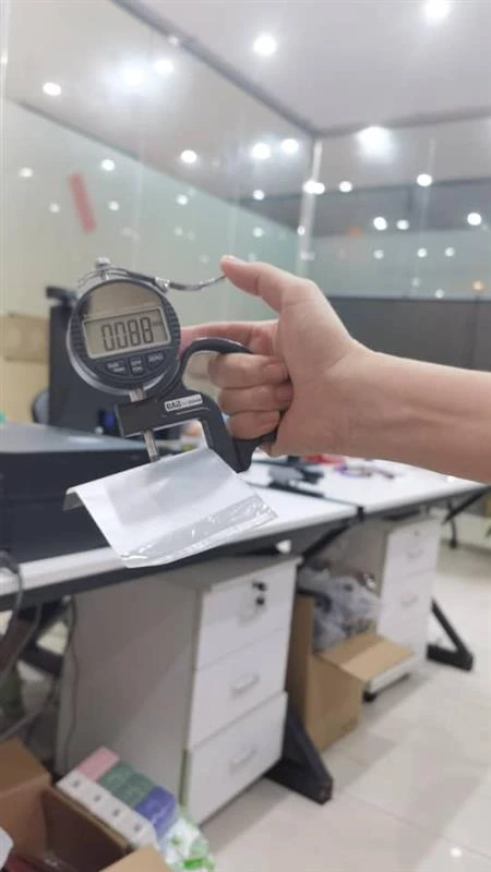 Quality Assurance Inspection of Custom Mylar Bags in Manufacturing Facility